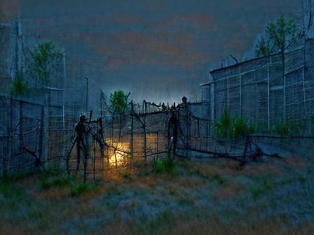 The Walking Dead abandoned prison yard wire fence dark sinis...