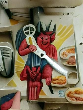 Satan holding a knife