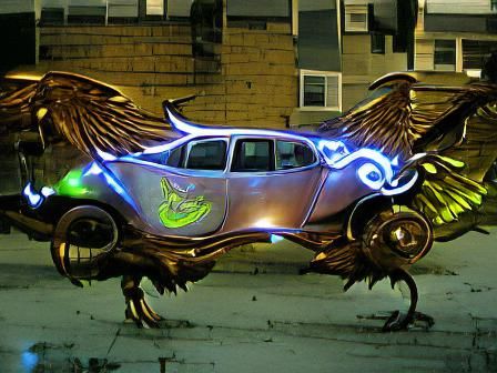 Winged beast car glowing neon steampunk