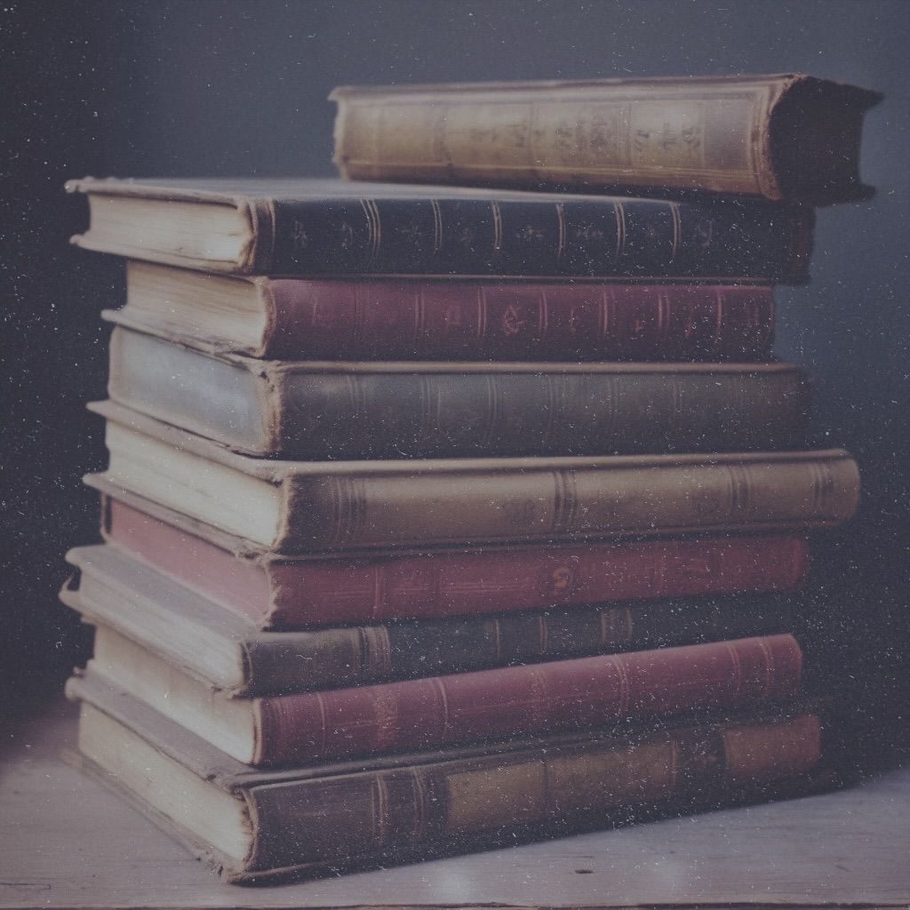 Stacks of old vintage antique books, beautiful faded colors, lovely illustrations, bold