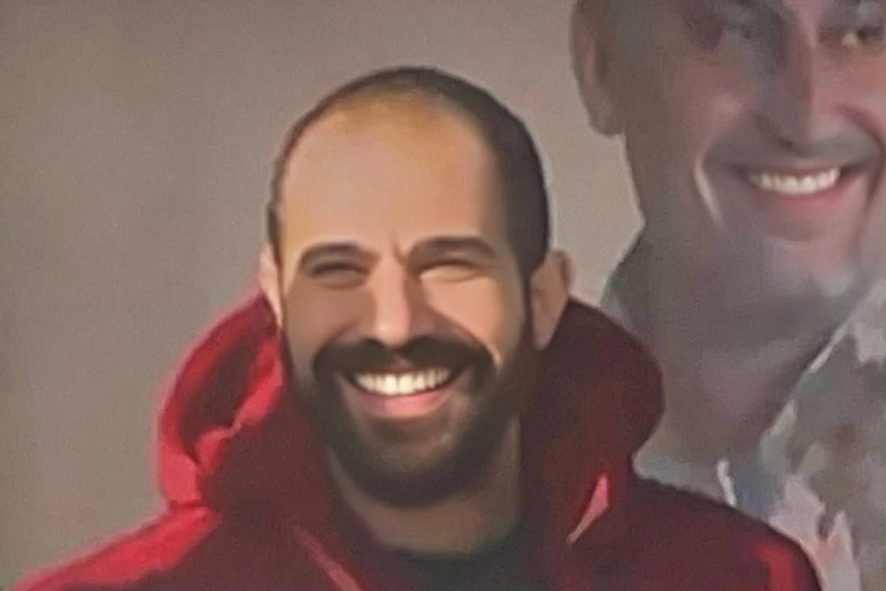 Man Smiling in Clearer Image