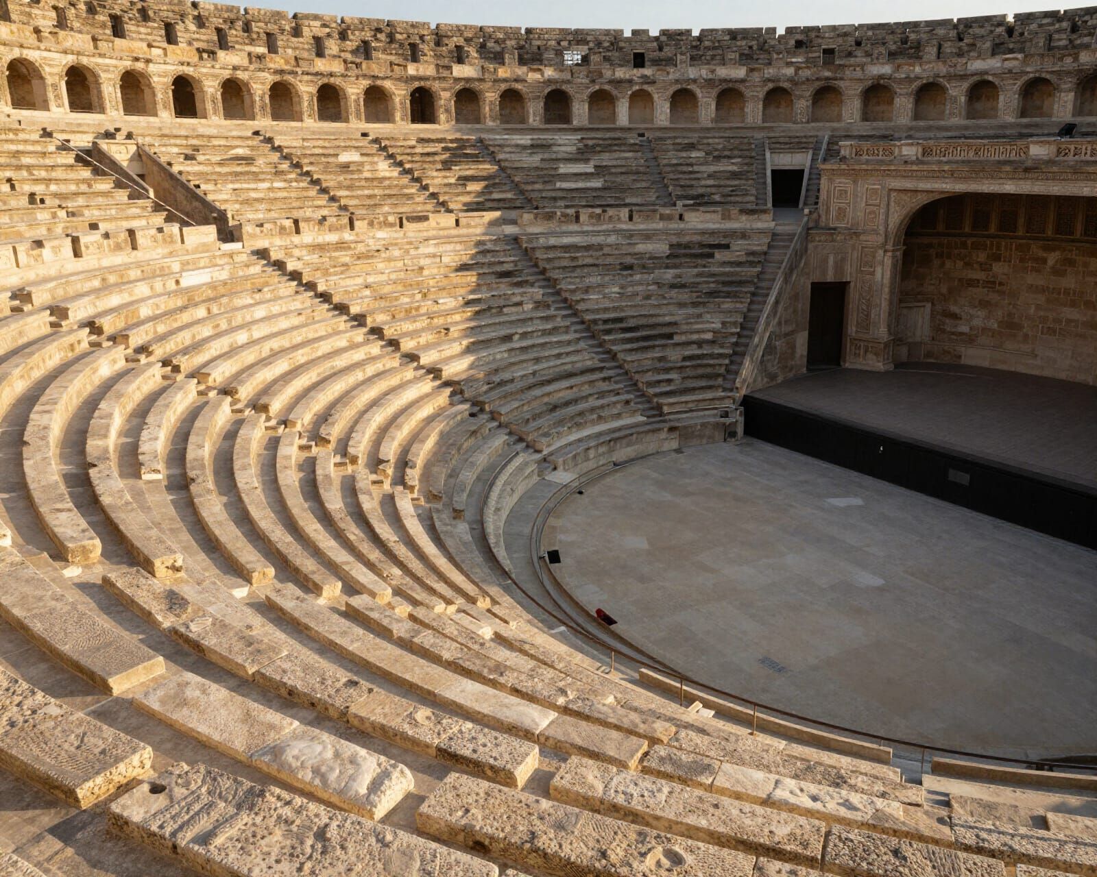 The interior of a vast, ancient amphitheater, where rows upon rows of stone seating curve in a perfect, ...  by @Thoragh