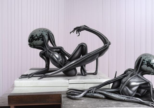 Giger's two wives. Glitter spray, translucent pink painted b...