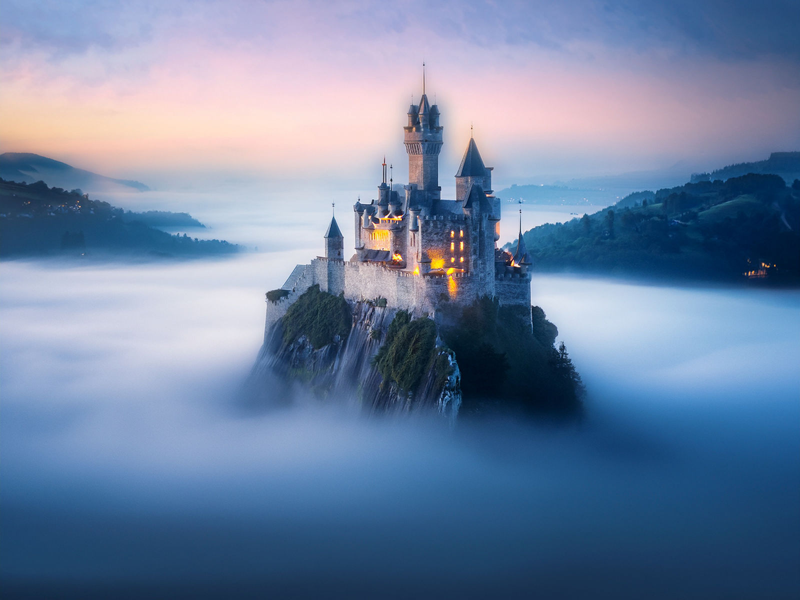 A majestic castle in very hazy fog