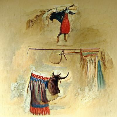 Bull charging woman hanging clothes