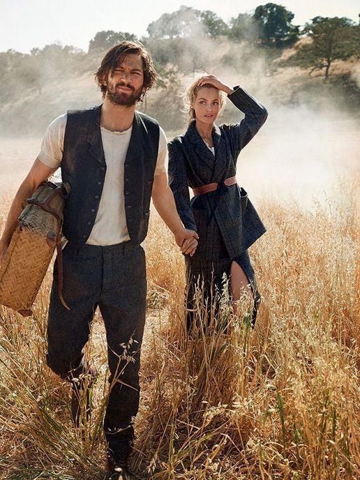  Concept art. Medium shot. A farmer holds a pear and carrot seeds in a field of wheat and hay.