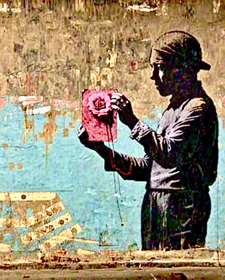 Wall art in the style of Banksy