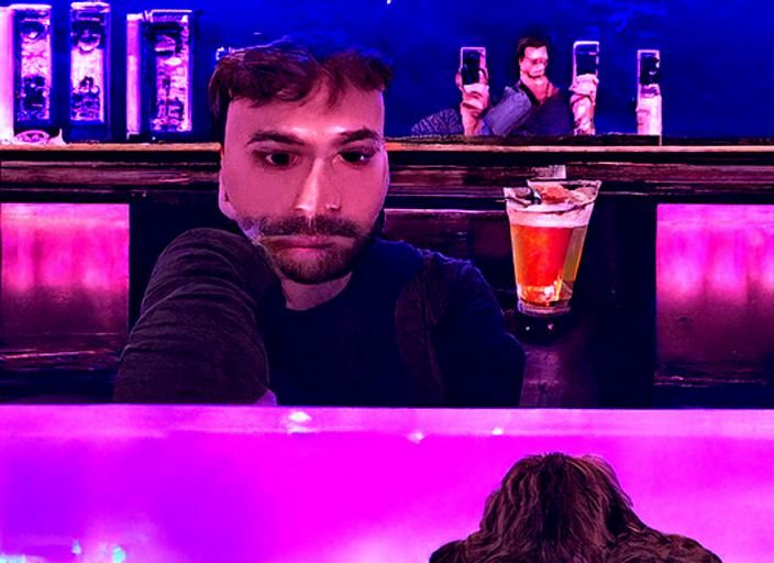 A narcissist pretending he's your friend at a bar