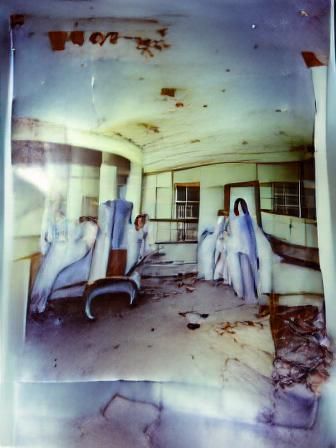 Abandoned hospital with ghosts of medical personnel Polaroid