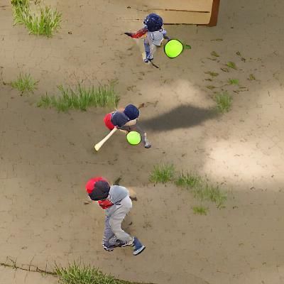 Two Children Playing Baseball Incorrectly