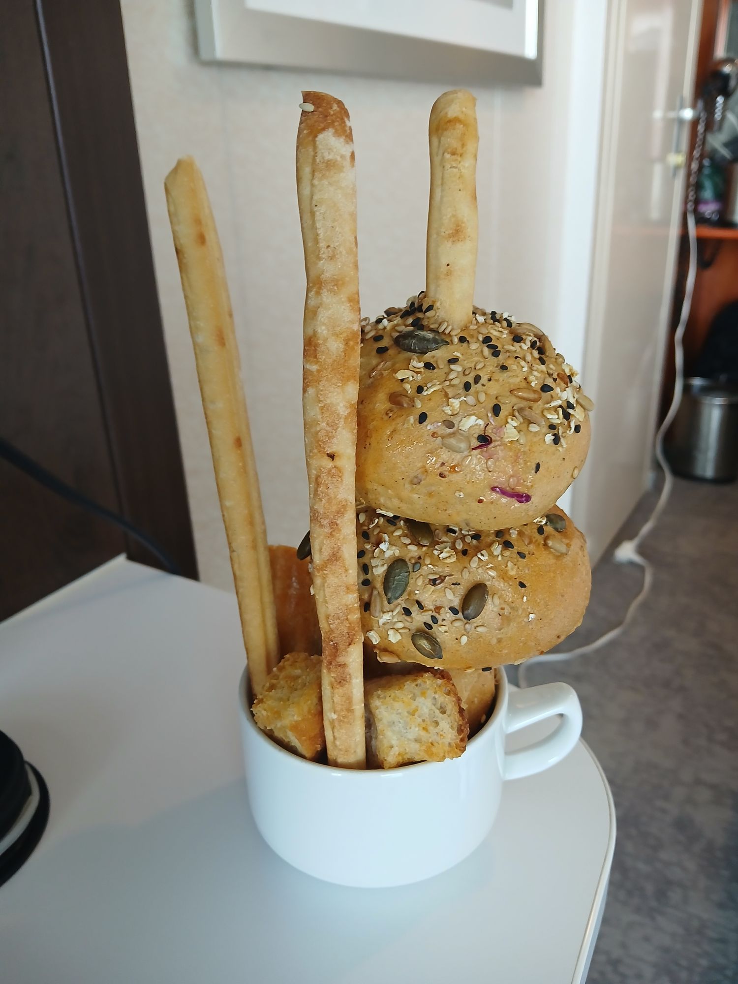 A strange alien creature and its babies on their home planet 