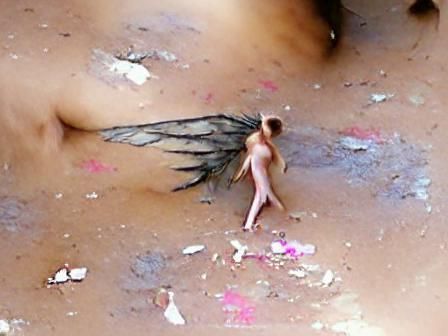 Naked Angel with Broken Wing