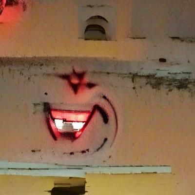 Demonic smilie face