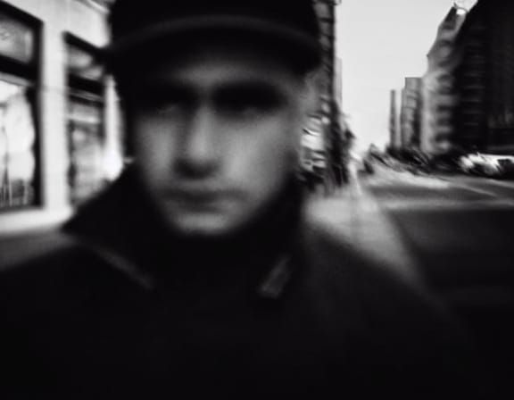 Soft focus, People walking on city sidewalks in the style of Saul Leiter Vivian Maier Diane Arbus Harold Feinstein Bruce Gilpin in sepia ton...