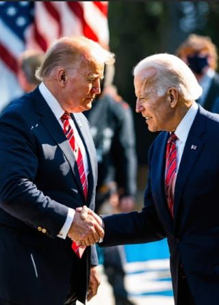 טראמפ וביידן לוחצים ידיים