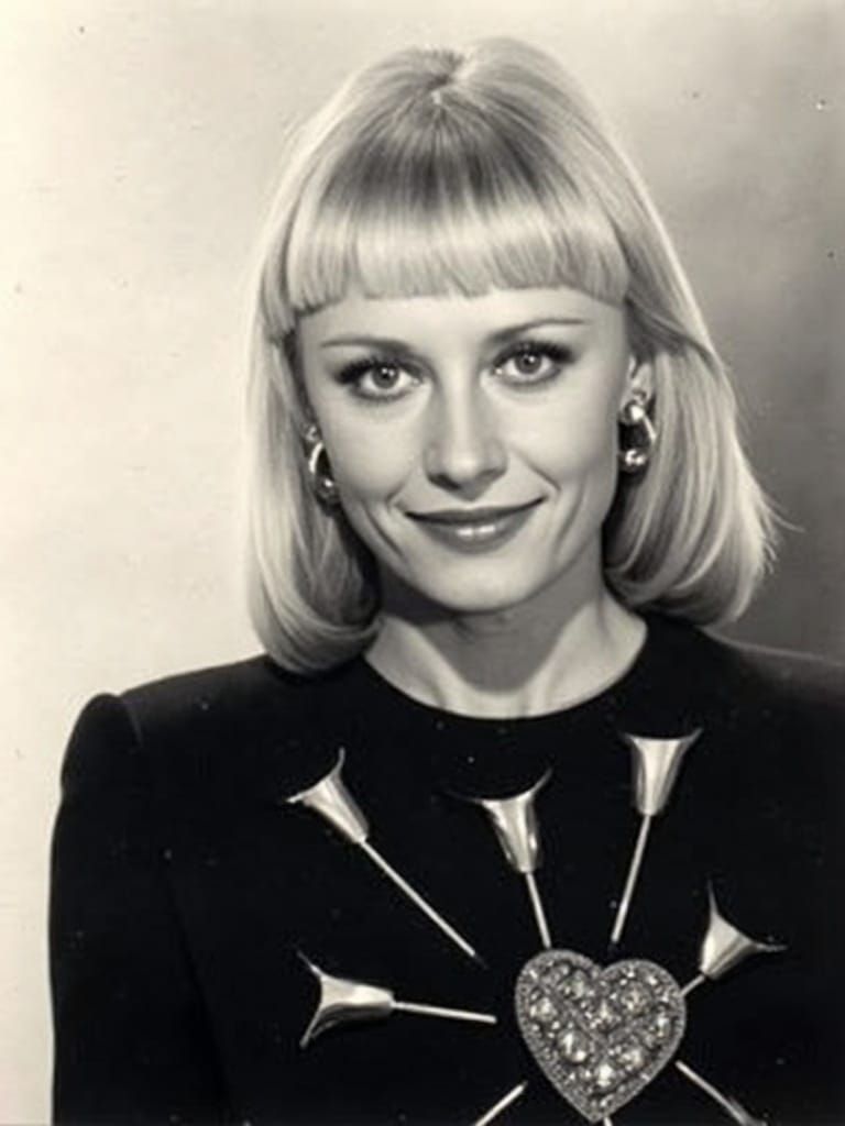Glamorous Woman in Velvet Dress with Red Sequin Heart