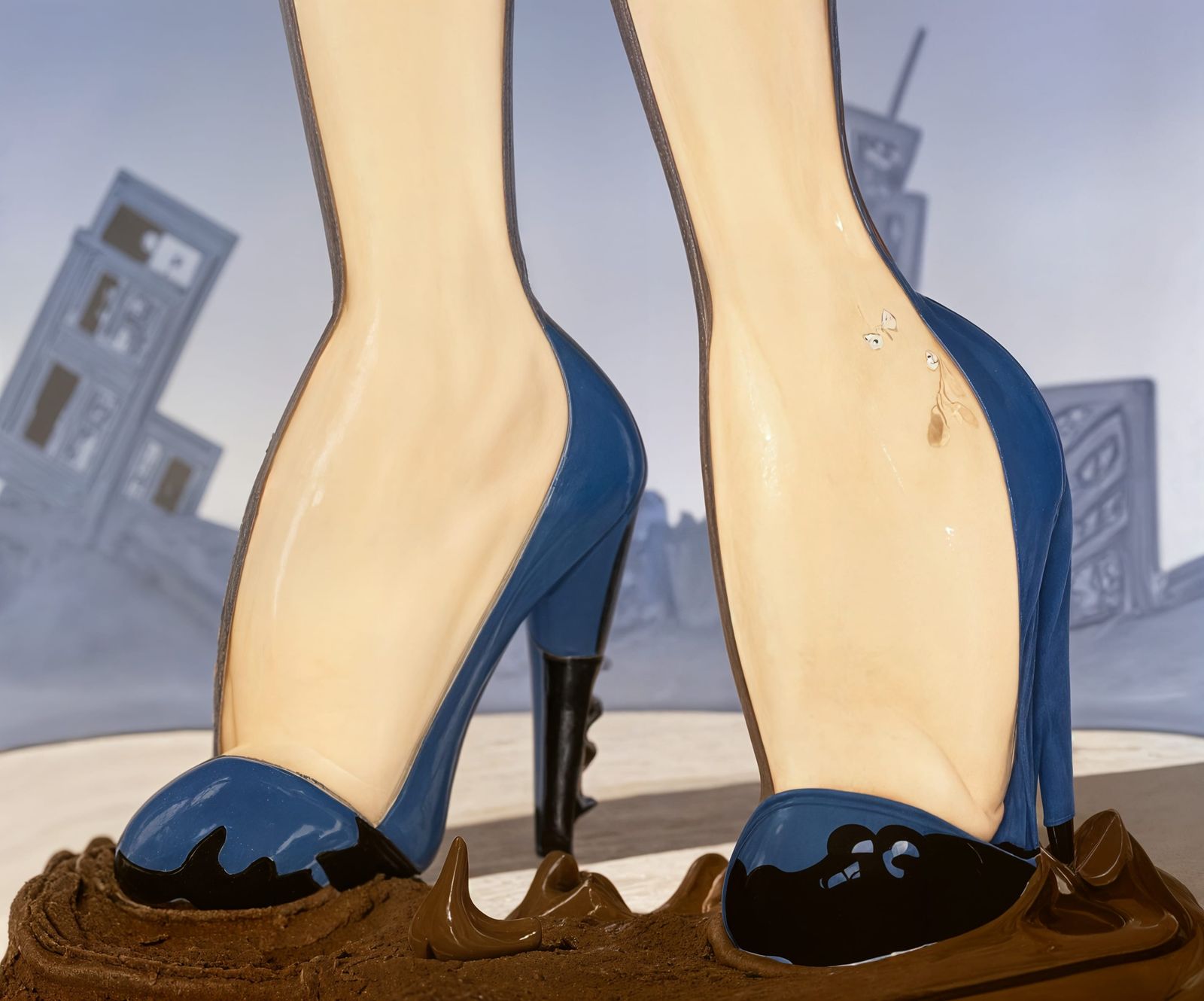 Candy Kitty's blue heeled shoes in mud