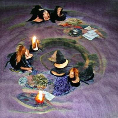 Witches in a circle chanting spells