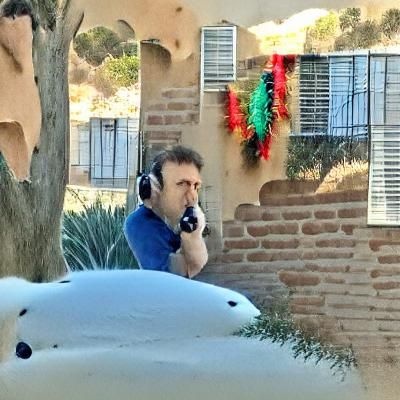 A man calling the cops about neighbors blasting spanish musi...