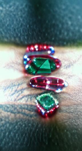 Green emerald red ruby blue diamonds