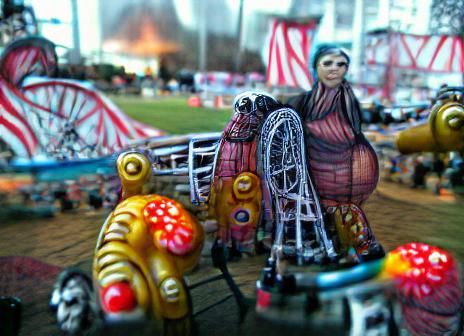 Butt-ugly carnival fat lady in a psychedelic muumuu, scary c...