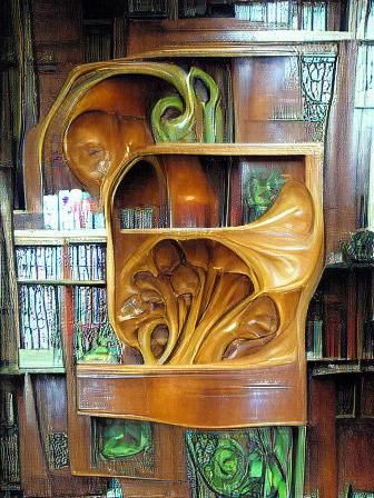 Carved wooden art nouveau bookcase John Howe