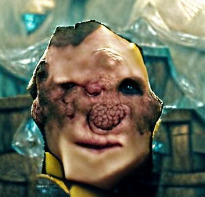 the face of a mutant, without nose, a hole for a mouth