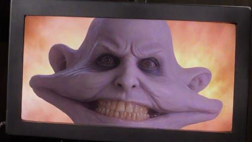 Very Creepy fooglie creature from a certain nightmare fuel 2001 spy movie evilly looking at the viewer