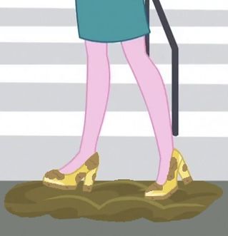 Dean Cadance's Golden Heeled Shoes in Mud