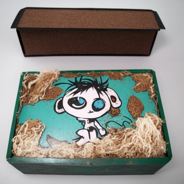 munny exploding out of a seaweed box