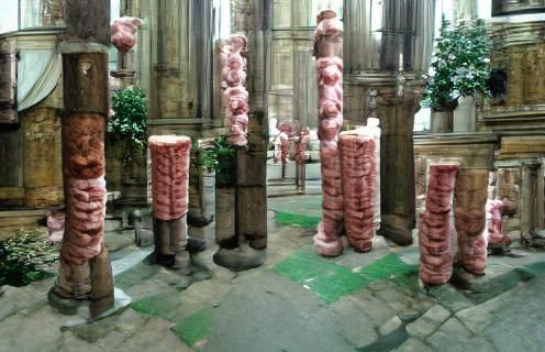 pillars made out of pig meat in a gothic church