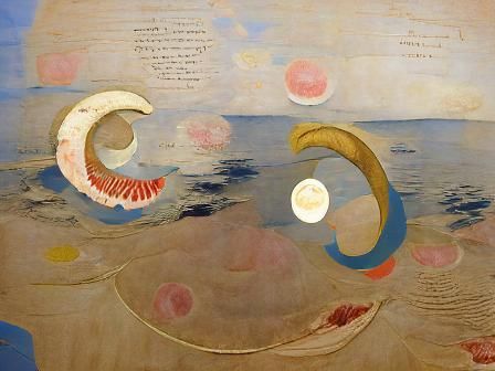 A crescent moon in the night sky reflected on the ocean’s wa...