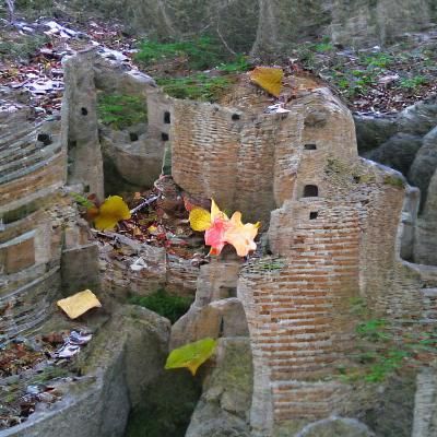 Amid the autumn leaves, the ruins of the old castle