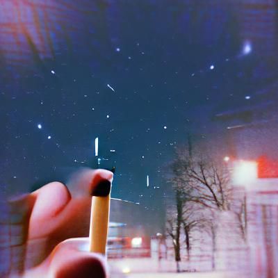 Smoking cigarettes in the cold at night