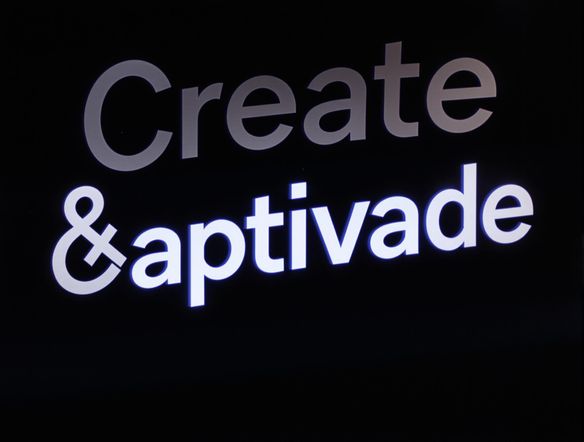A sleek, modern animation of the phrase "Create & Captivate" rotating and morphing against a dark background. Use a clean, sans-serif font and a subtle glow effect. Include a small, stylish T chart icon subtly embedded within the animation.