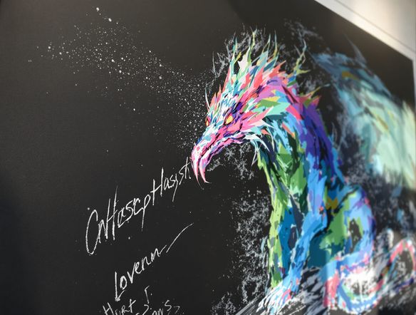 Vibrant chalk drawing of a mythical creature on a textured blackboard, with chalk dust subtly in the air.