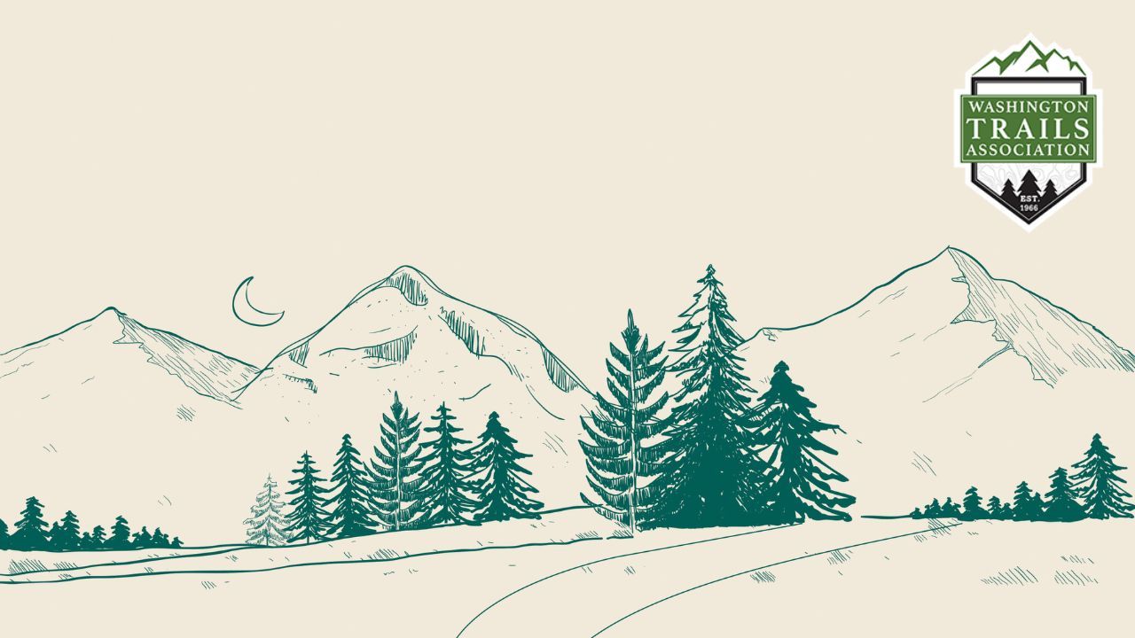 Hiking trail with a black female hiker and a marmot in the distance