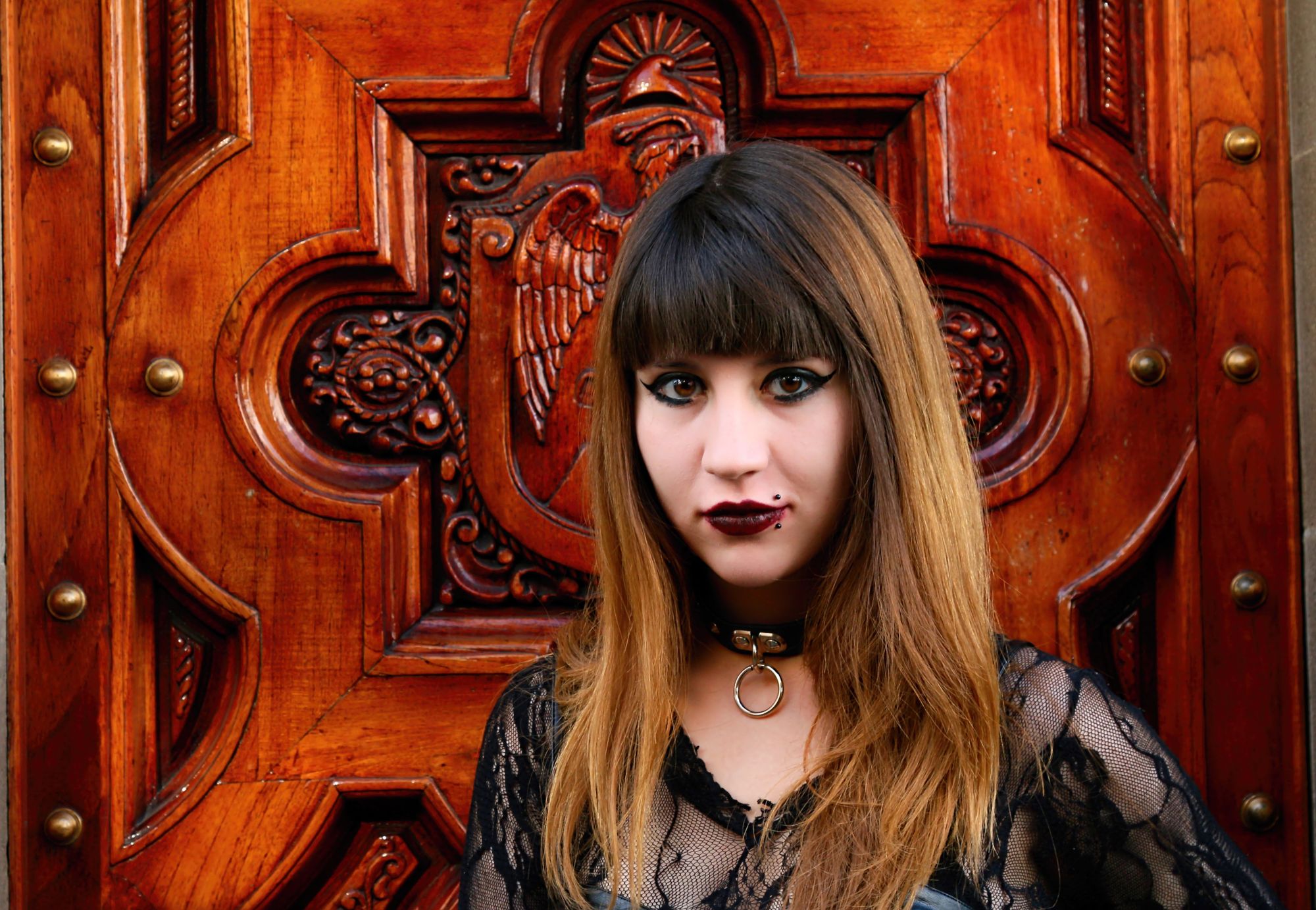 a surreal fantasy with lighting , and dead creepy trees surrounds the model