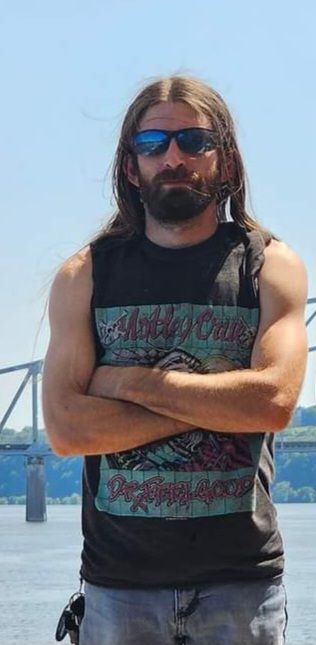 (Fantasy Male Viking warrior:0.5)(viking armor)(<subject>:0.15) remove sunglasses, battlefield for background, sword sheathed on warriors hi...