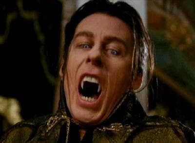 Daisy Ridley as a vampire snarling