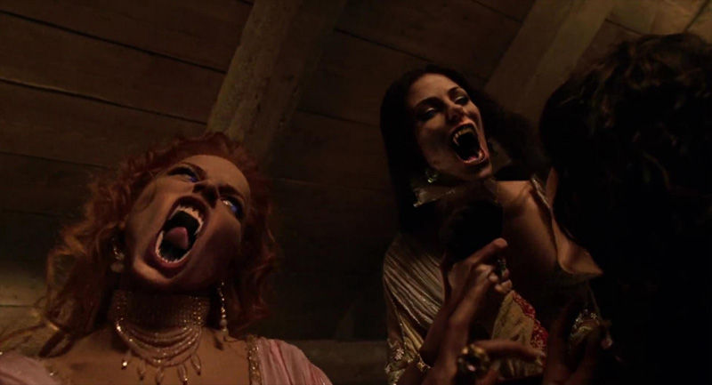  Bryce Dallas Howard and Scarlett Johansson as vampires snarling