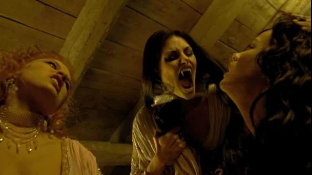 Miranda Cosgrove and Jennette McCurdy as vampires hissing with sharp fangs