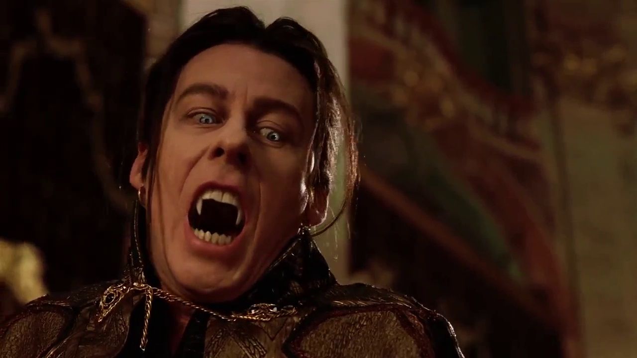 Female vampire in knight armor hissing with sharp fangs