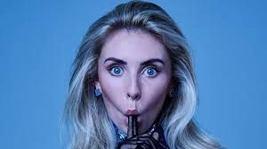 keep the head and pose and give her a body and make it really fat and give her a baggy outfit, and around her are 10 mens with white tank to...