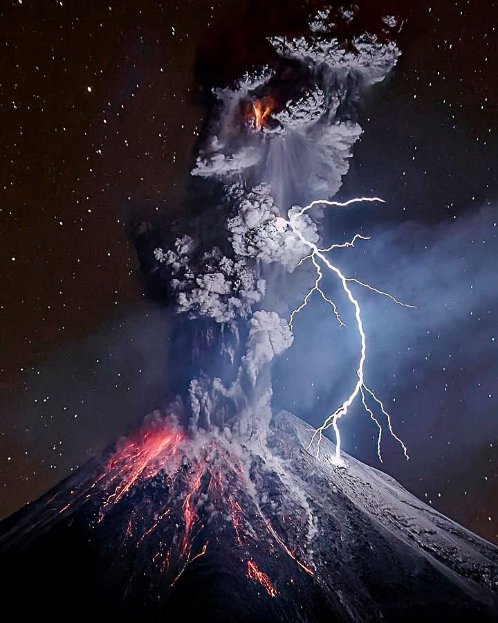 menacing volcanic eruption on a starry night