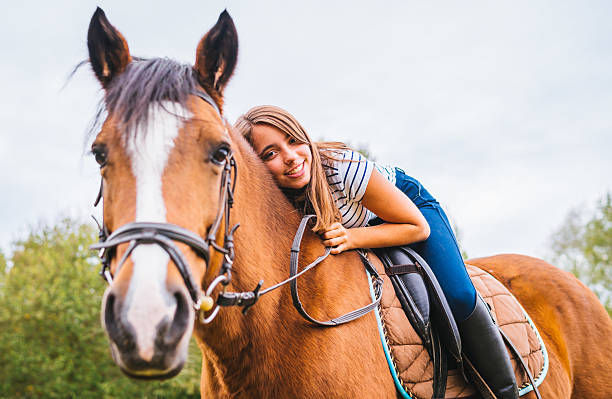 Horse & girl, best buddies resting together