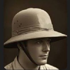 A young man in a 1920's pith helmet.