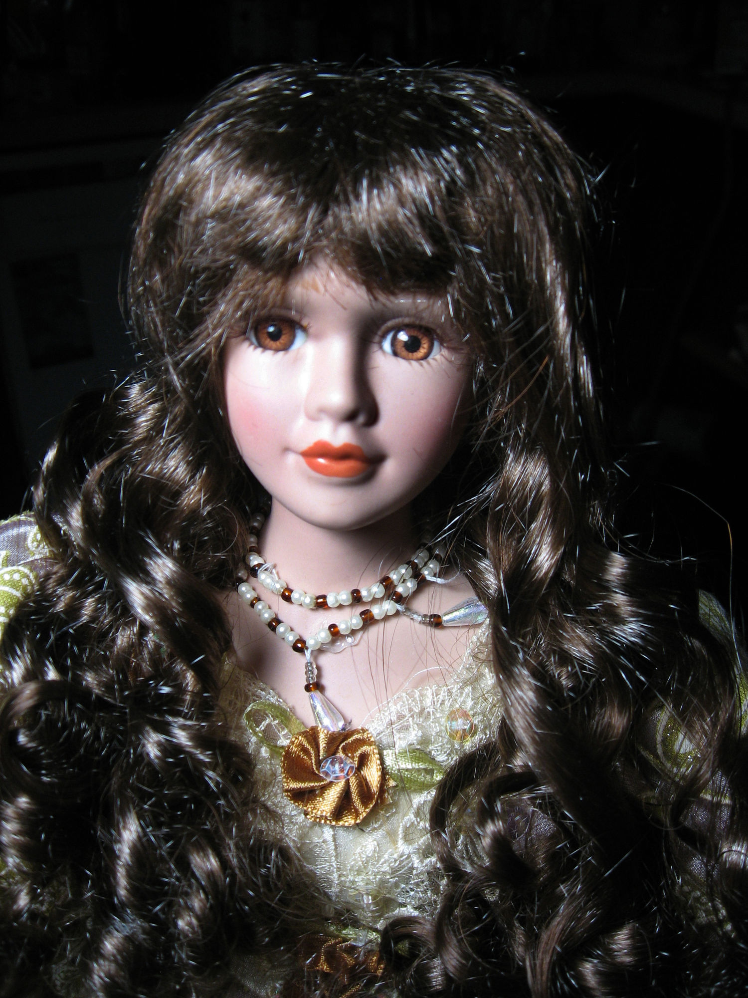 A Woman With Long Dark Hair And Brown Eyes