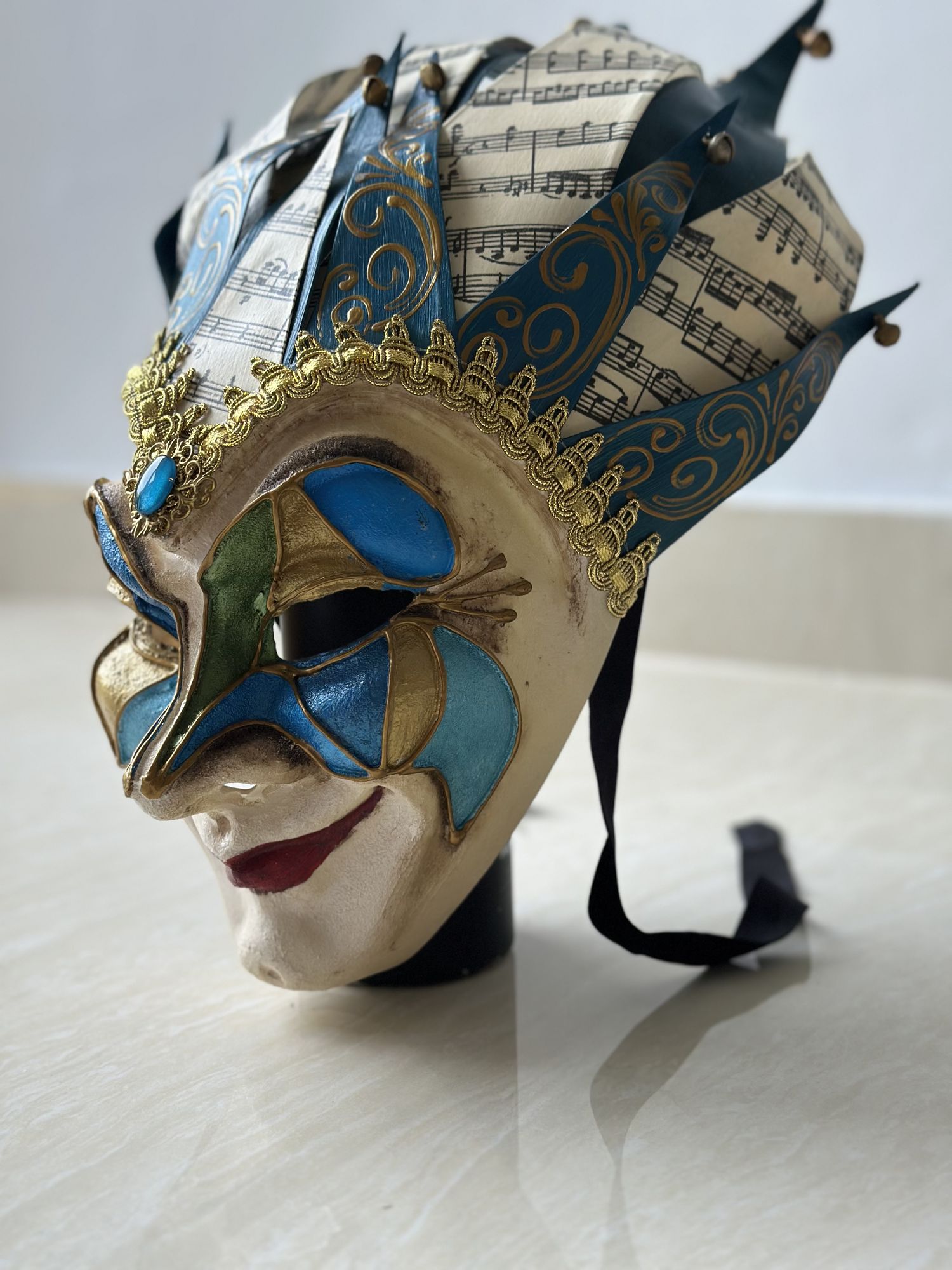 removeq the entire background and replace it with a solid warm light background, even out the light and shadows without changing the texture...