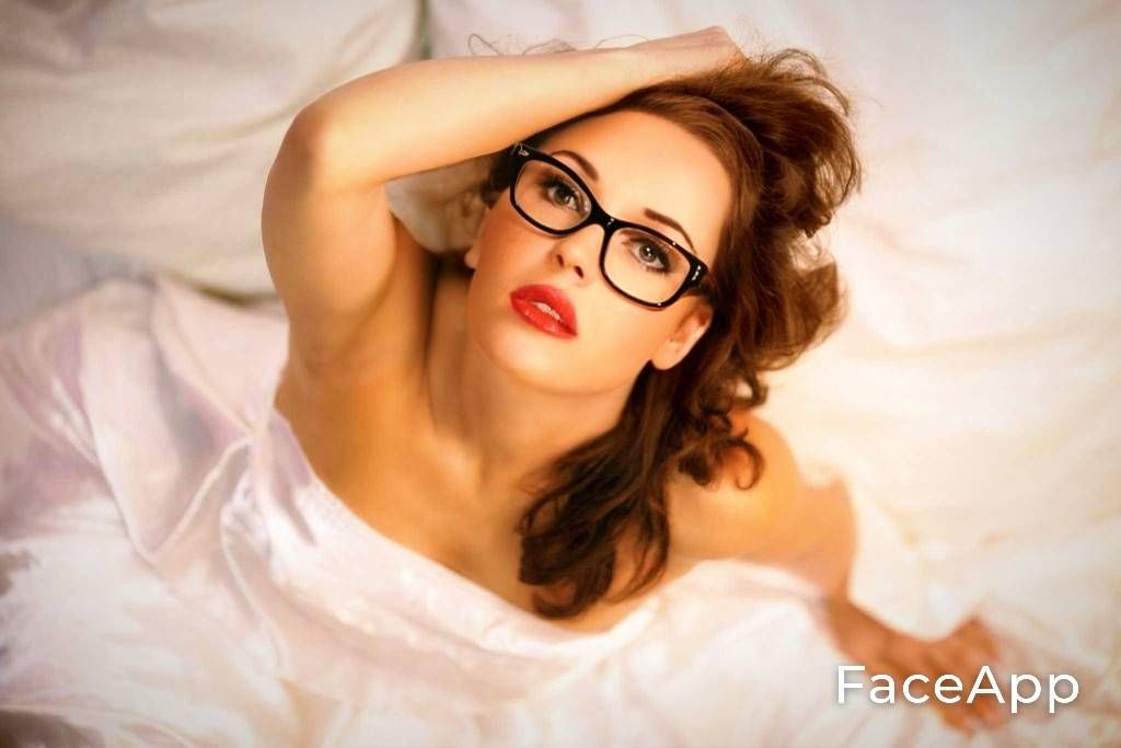 Cover of magazine called "Modern  Bride". a beautiful bride  with extra long shining black hair, glasses, in a luxurious floor-length weddin...